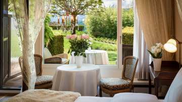 Park Hotel Sonnenhof Junior Suite Exclusive Junior Suite at Park Hotel Sonnenhof with views of the greenery and access to the private garden terrace